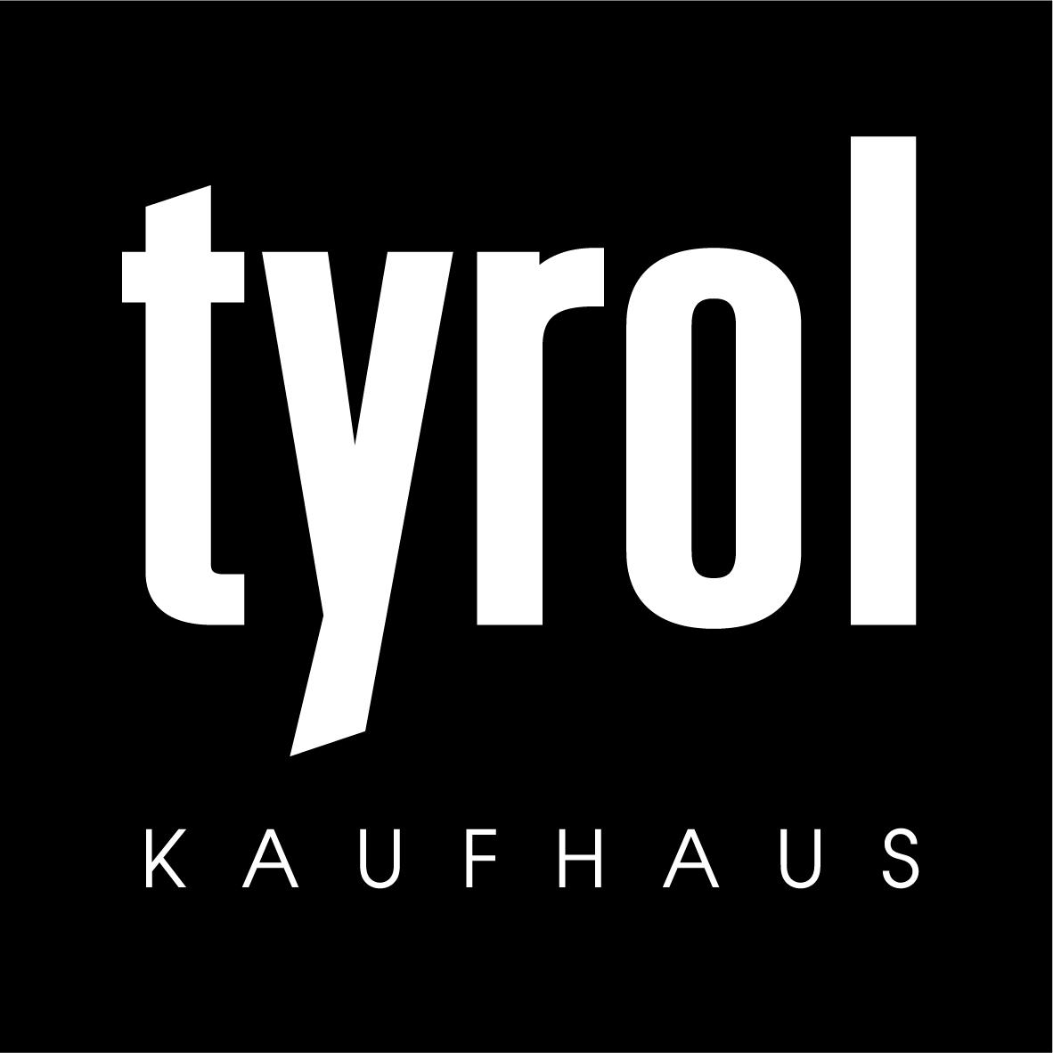 Weißes Logo des Kaufhaus Tyrol auf schwarzem Hintergrund mit dem großen Wort tyrol und dem Zusatz KAUFHAUS in Großbuchstaben.