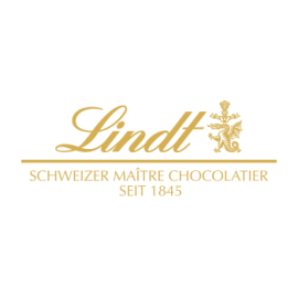 Elegantes, goldfarbenes Logo „Lindt“ mit feinem Wappen und dem Zusatz „SCHWEIZER MAÎTRE CHOCOLATIER SEIT 1845“ auf weißem Hintergrund.